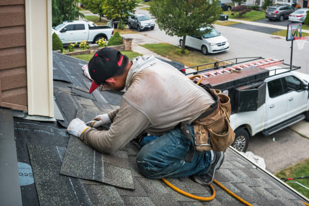 Professional Roofing technician working in Harrison, MI